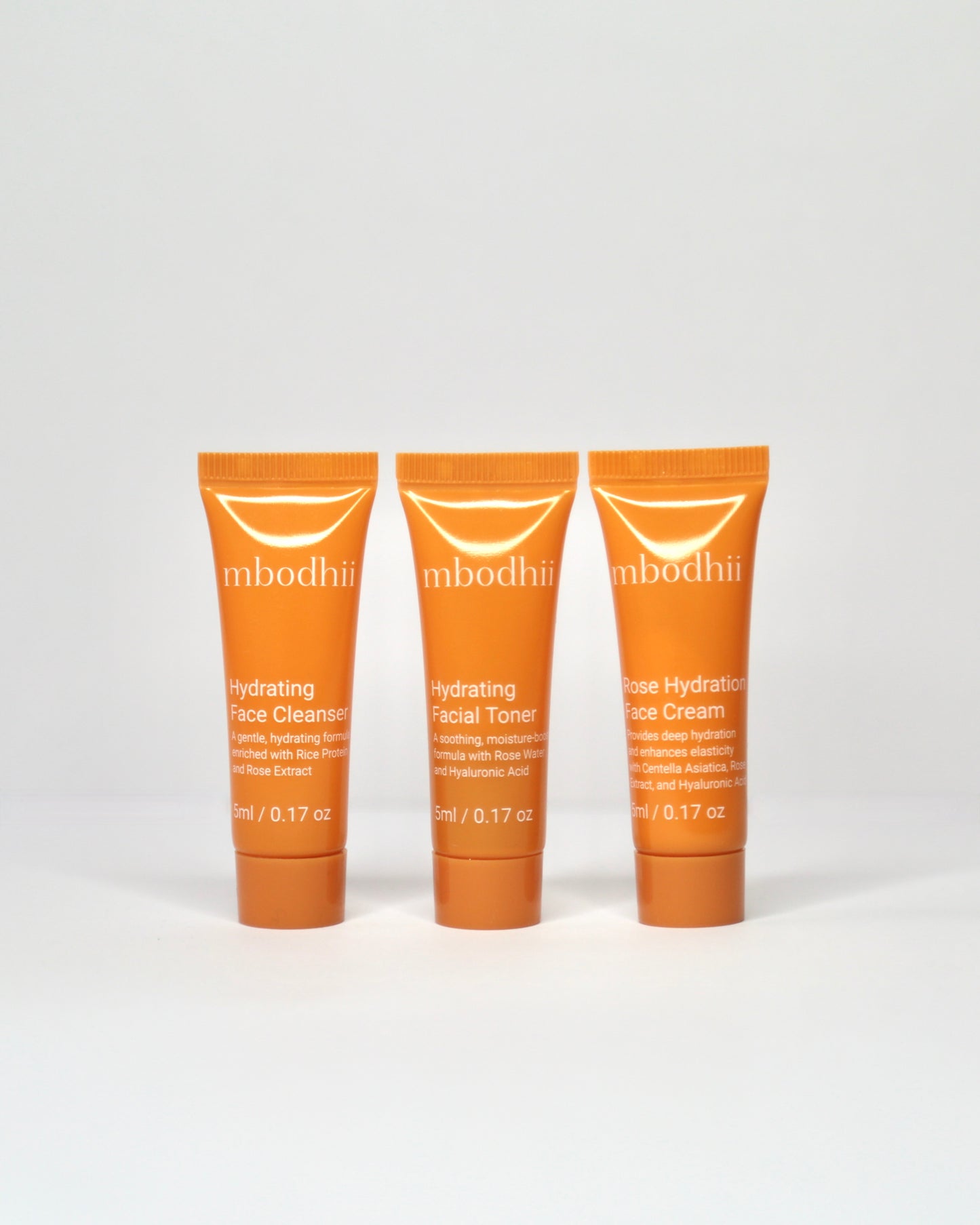 The mbodhii Mini Sample Pack including 5ml each of the Hydrating Face Cleanser + Hydrating Facial Toner + Rose Hydration Face Cream on a white background