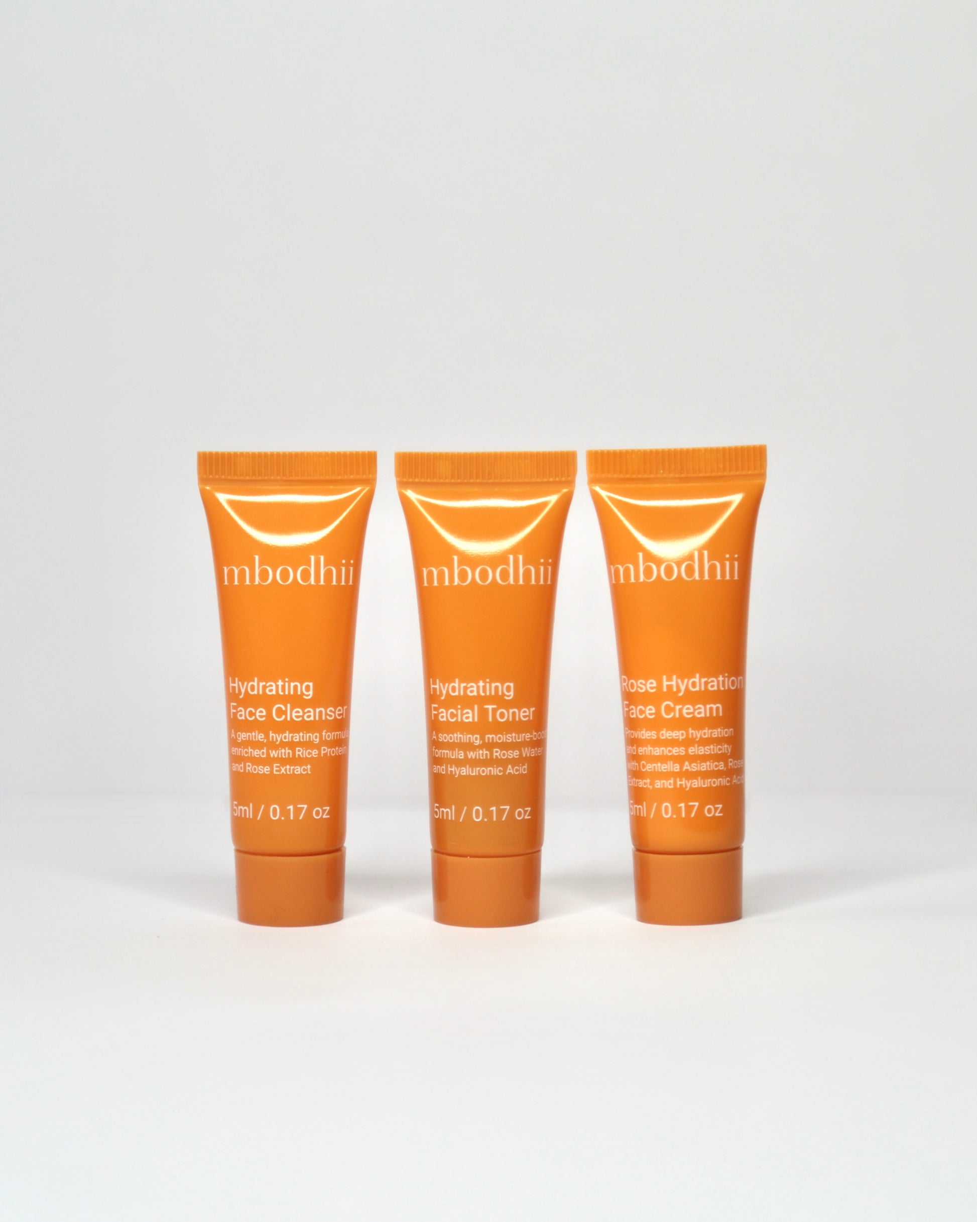 The mbodhii Mini Sample Pack including 5ml each of the Hydrating Face Cleanser + Hydrating Facial Toner + Rose Hydration Face Cream on a white background