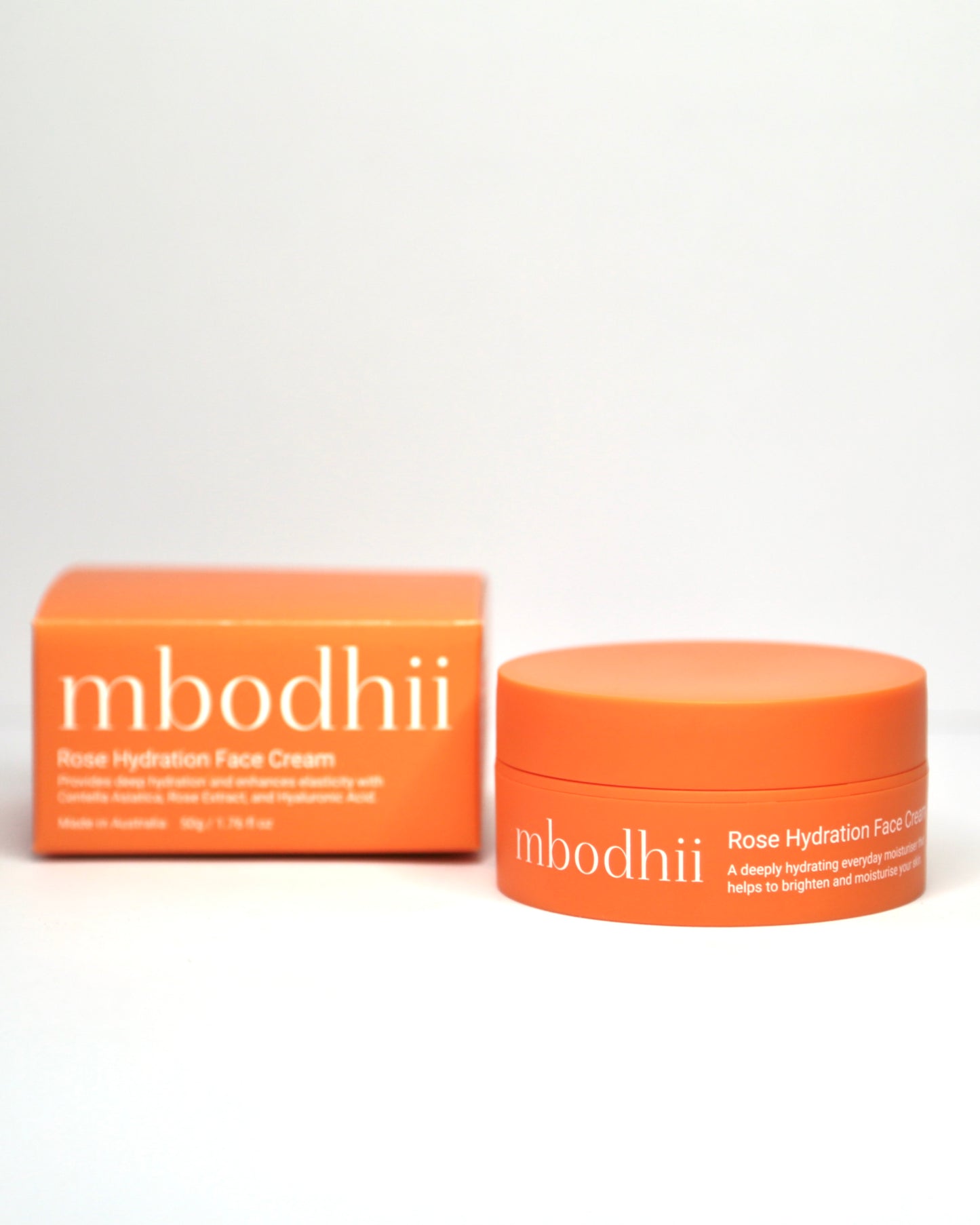 Orange mbodhii Rose Hydration Face Cream jar and box on a white background