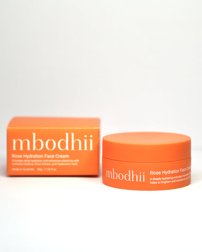 Orange mbodhii Rose Hydration Face Cream jar and box on a white background